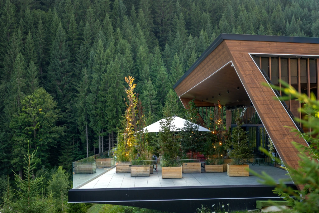 modern-wooden-house-mountains-terrace-with-panoramic-view.webp